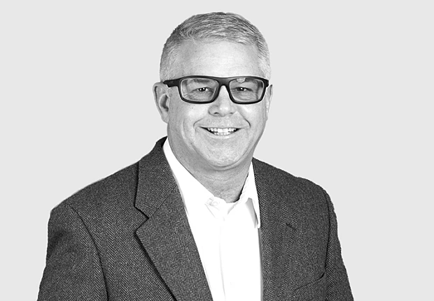 A headshot image of Warren Harris