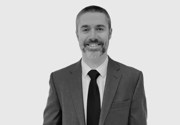 A headshot image of Bryant Hendrickson