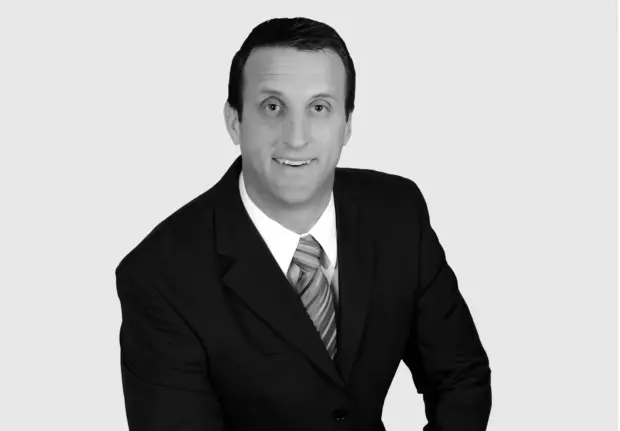 A headshot image of Jason Ford