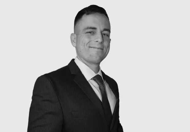 A headshot image of Jonathan Hughes