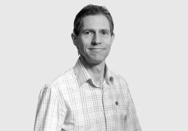 A headshot image of James Dominguez