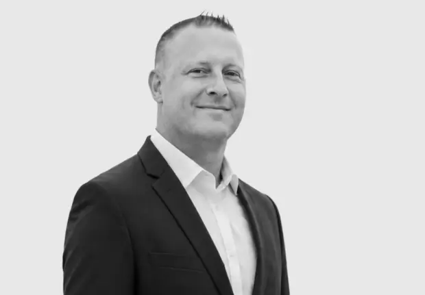 A headshot image of Darren Osleger