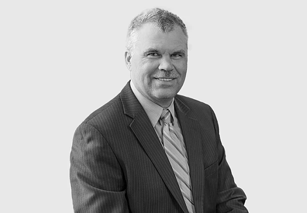 A headshot image of Kirk Jennings