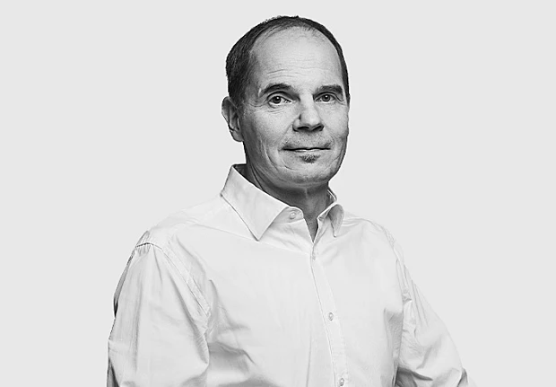 A headshot image of Jukka Liikanen