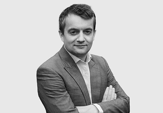 A headshot image of Henry Wilkinson