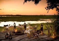 Zarafa camp dinner setting by the firepit 1280