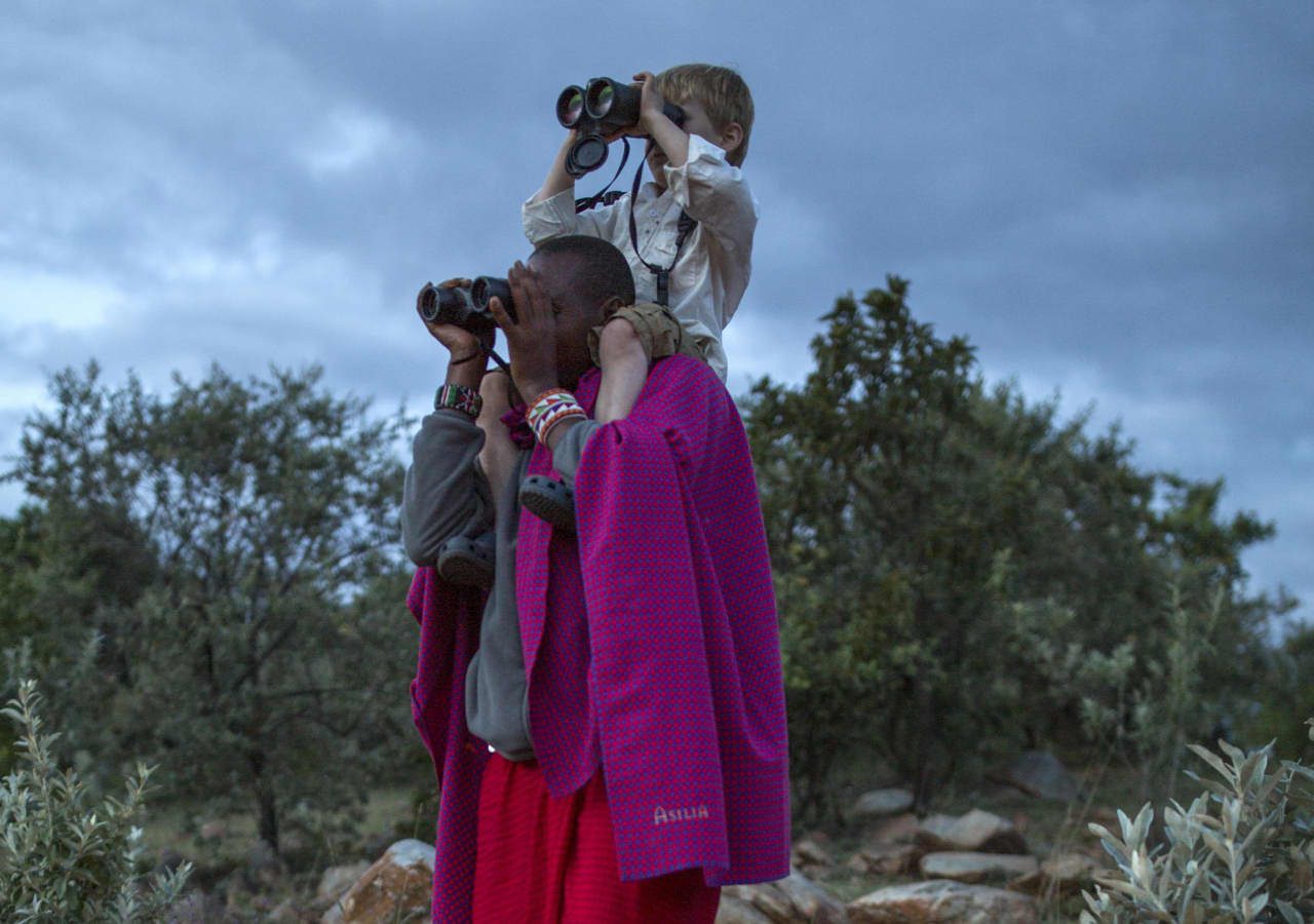 Asilia mara house maasai guide with child 1280