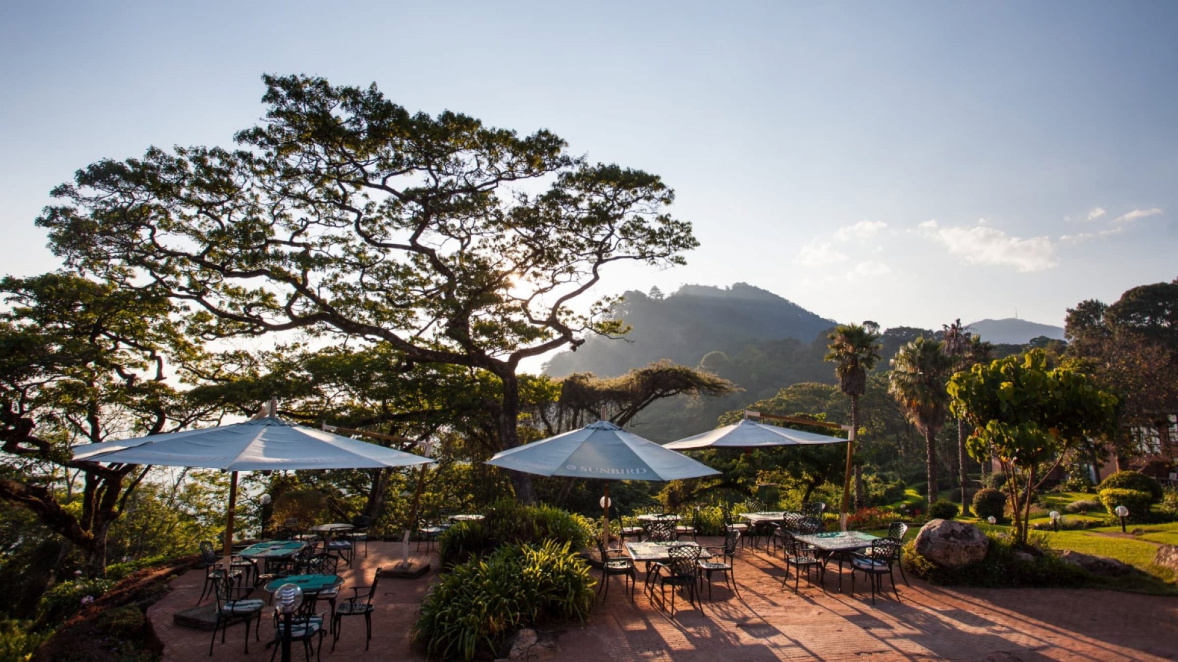 Ku chawe inn dining terrace in the garden 2400
