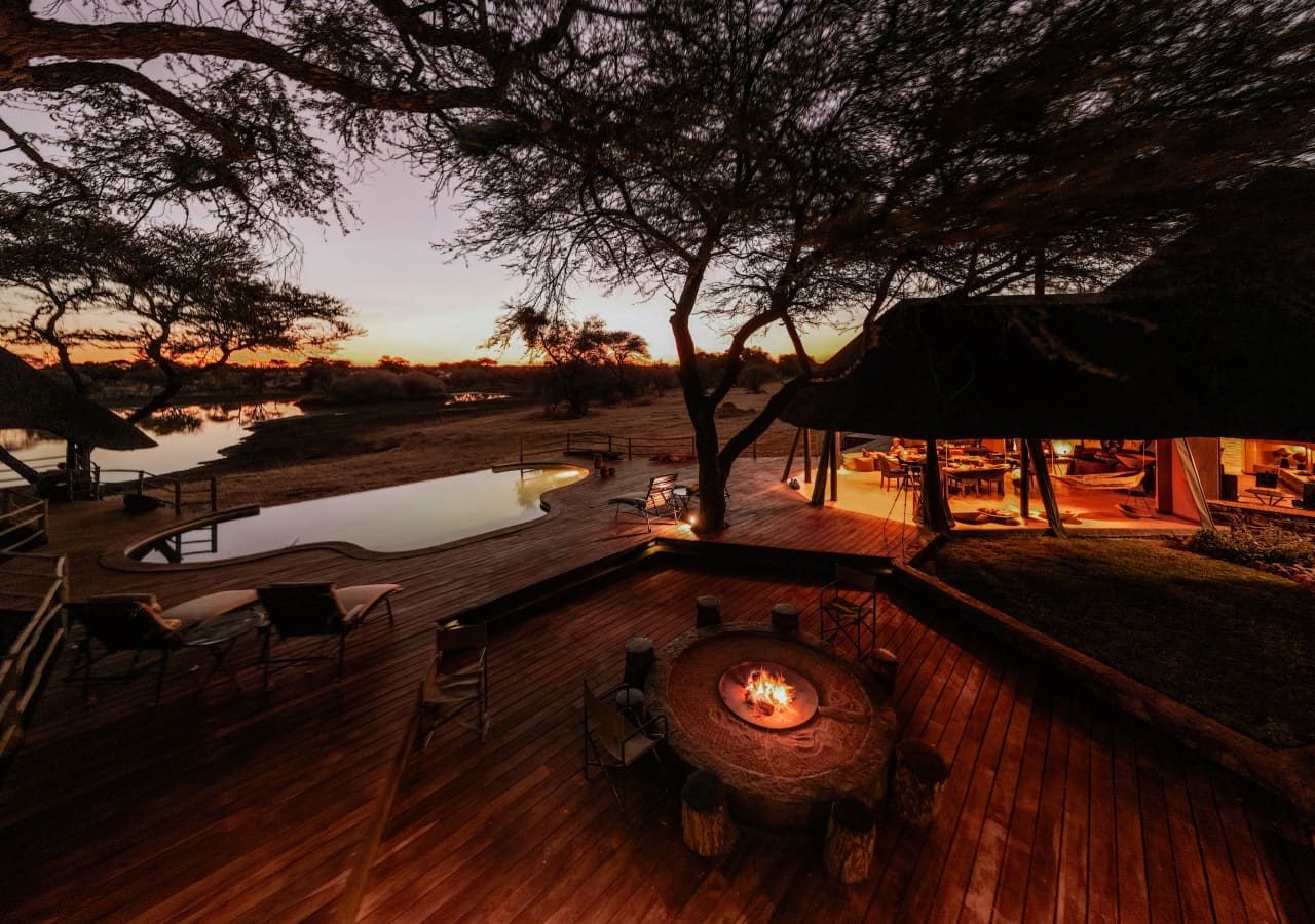 Okonjima african villa sunset around the firepit 1280