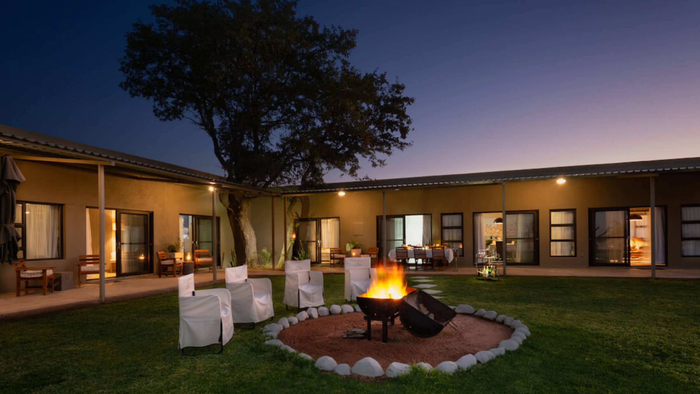 Safari house house exterior at night 2400