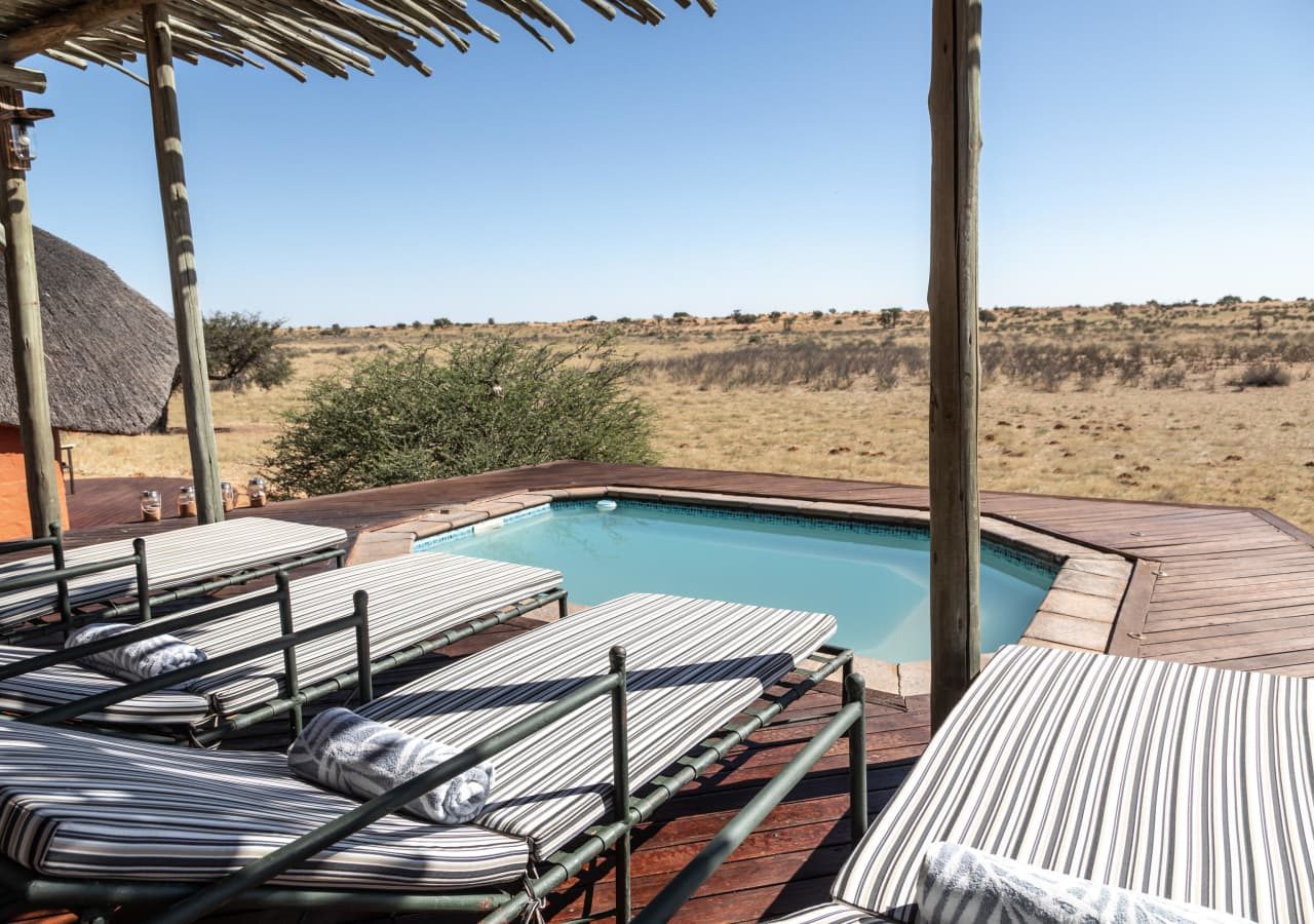 Kalahari red dunes lodge swimming pool 1280