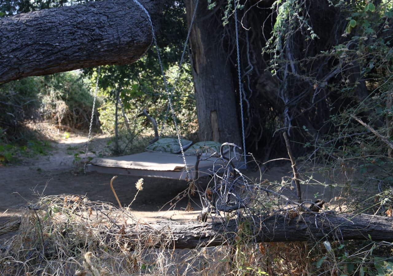 Epupa camp daybed under the trees 1280