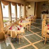 Hansa hotel indoor terrace and dining area 1280