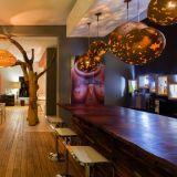 The olive exclusive all suite hotel bar and dining area 1280