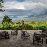 Virunga lodge terrace with a view of the mountains 1280