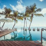 Carana beach hotel infinity pool and lounge area 1280