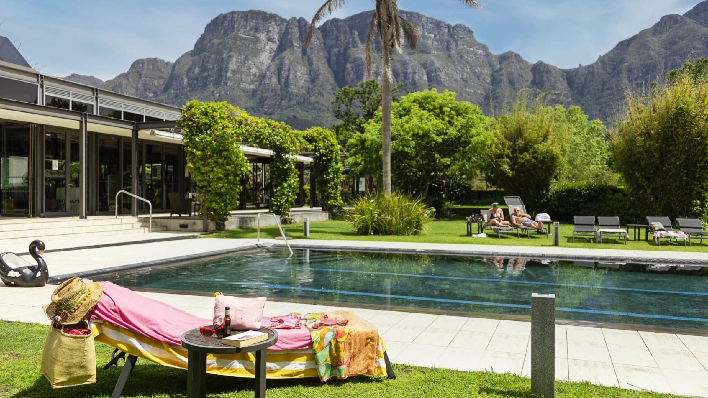 Vineyard hotel and spa pool area with view of table moutain 2400