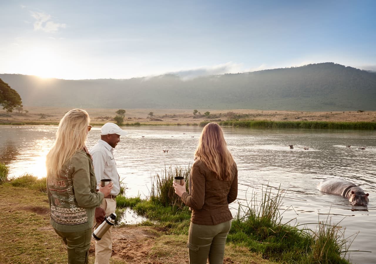 Sanctuary ngorongoro crater camp spotting hippos with a private guide 1280
