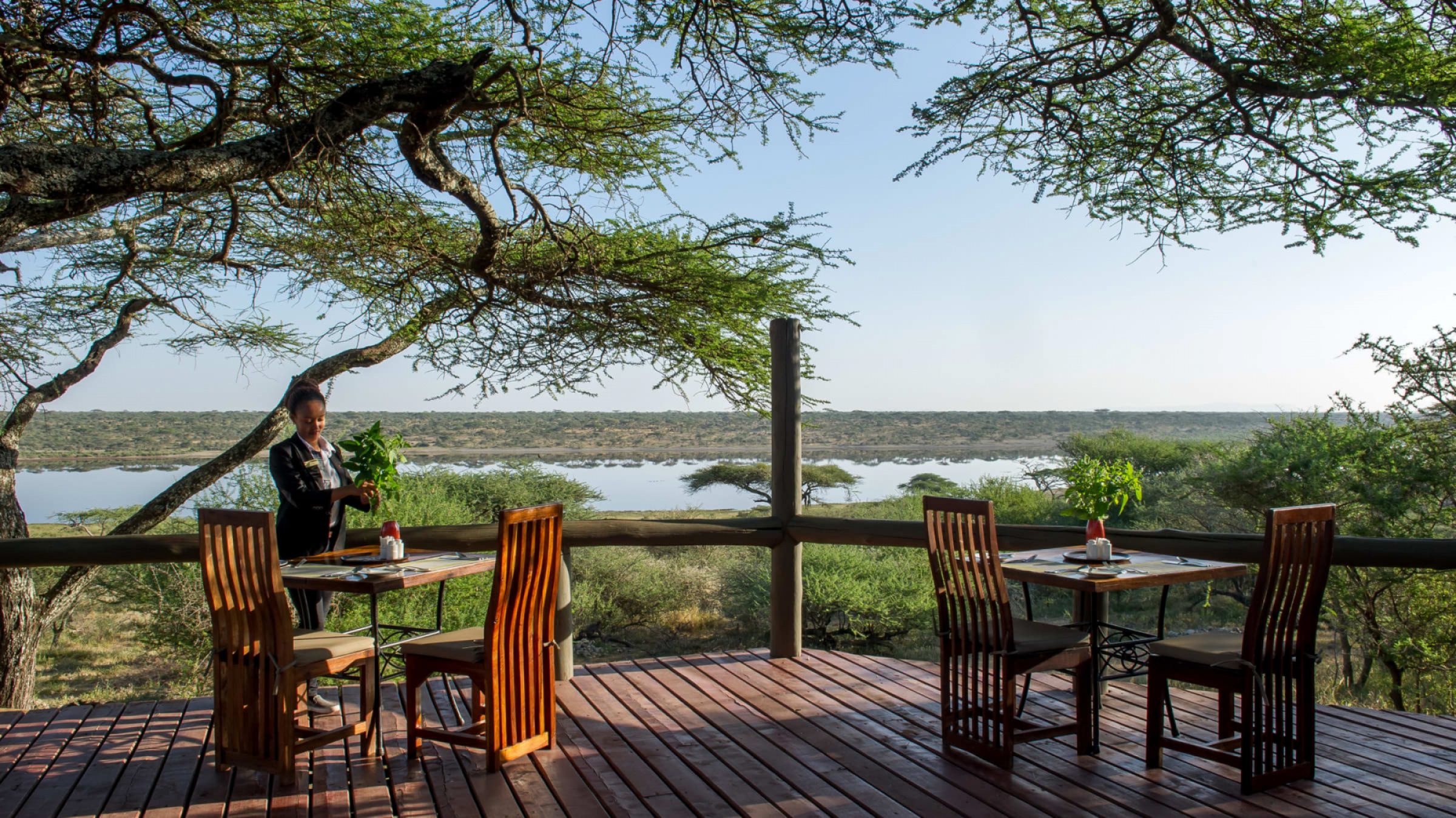 Lake masek tented lodge outdoor dining with view of the lake 2400