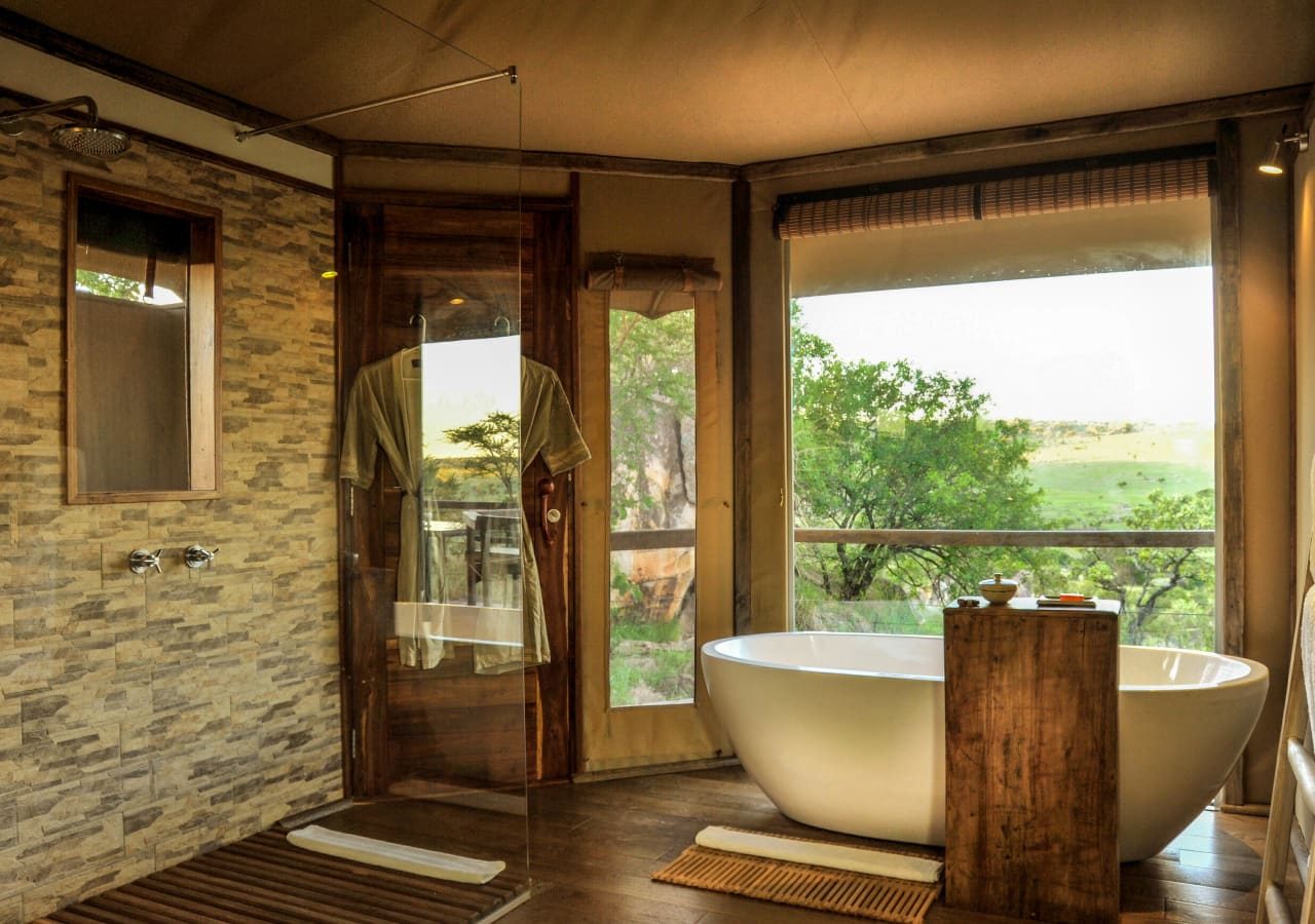 Lemala kuria hills lodge bathroom interior and view 1280