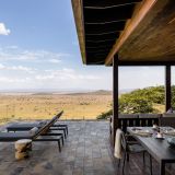 Singita sasakwa lodge lounge deck with a view of the landscape 1280