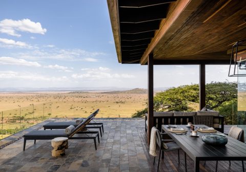 Singita sasakwa lodge lounge deck with a view of the landscape 1280