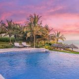 Zawadi hotel sunset at the infinity pool 1280