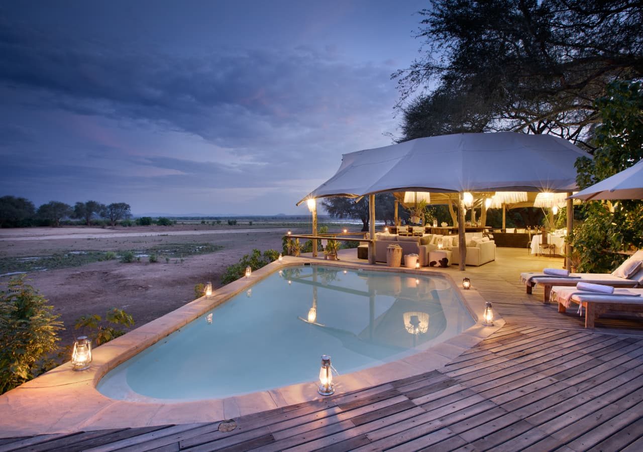 Anabezi luxury tented camp swimming pool and outdoor lounge 1280