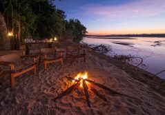 Bilimungwe bushcamp sunset bonfire by the river 1280