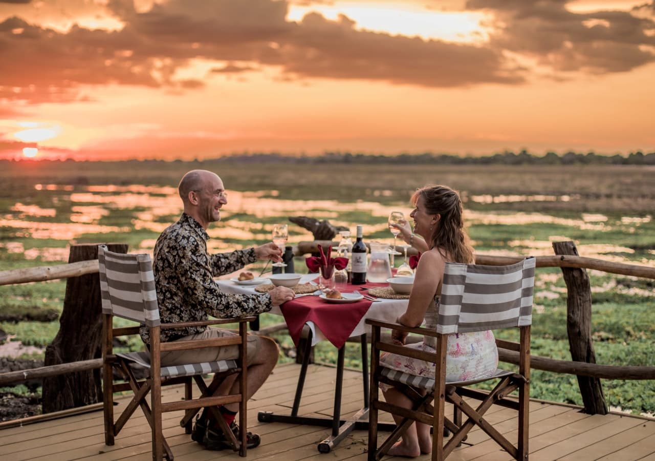 Kafunta river lodge sunset dining on the deck 1280