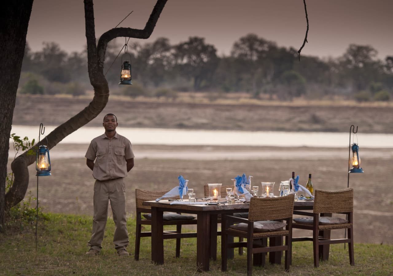 Luangwa river camp dining by the river 1280