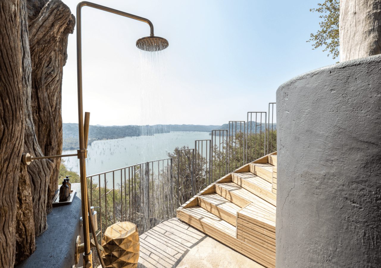Singita pamushana lodge outdoor shower with a view 1280