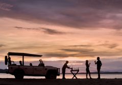Bumi hills safari lodge sundowners by the lake 1280