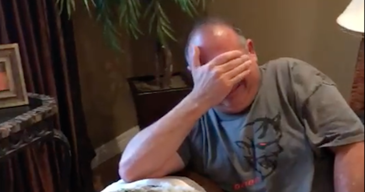 man surprised by puppy