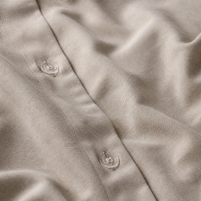 cashmere duvet set in oatmeal — stitching and closure detail