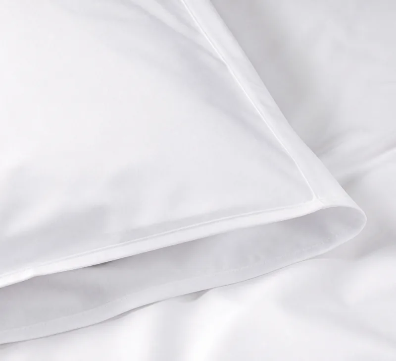 percale pillowcase pair in white — stitching and closure detail