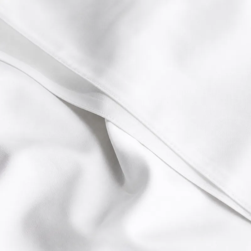 percale sheet set in white — stitching and closure detail