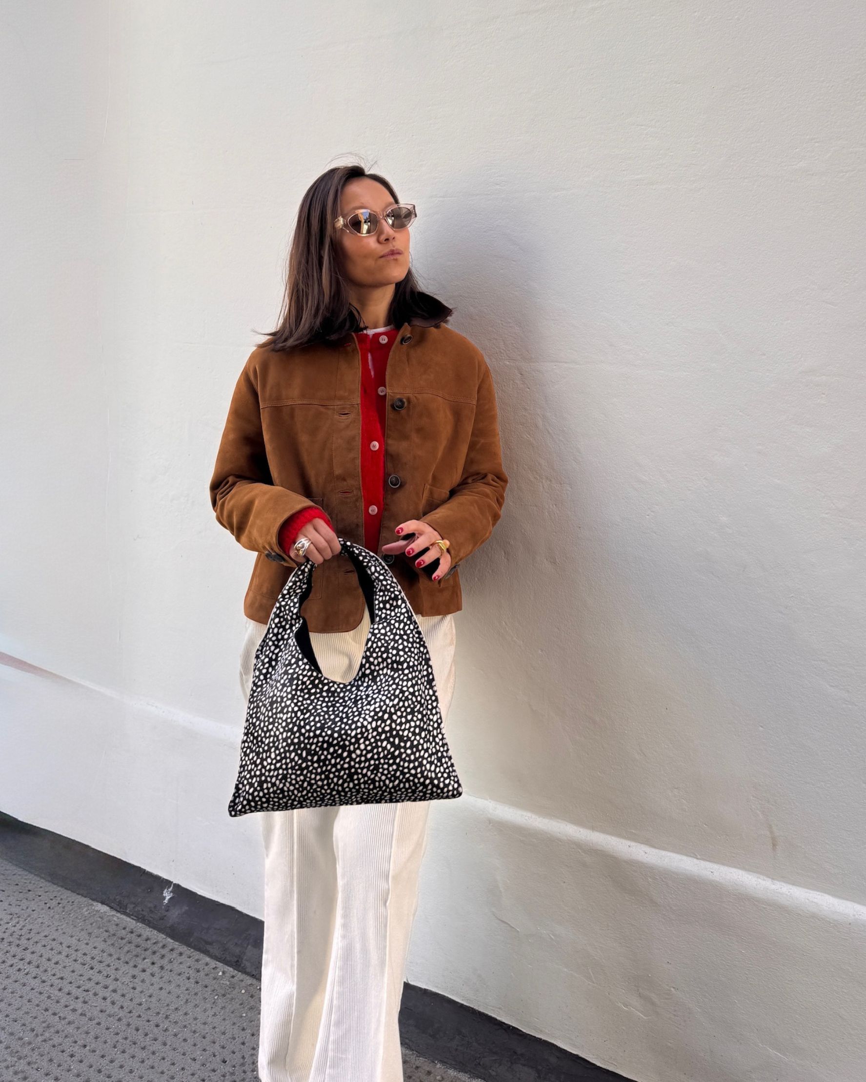 Small Sling Bag in Black Dotted Animal Print - alternate view