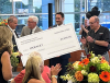 Pacifico Presents Merakey with $5,000 Donation Check