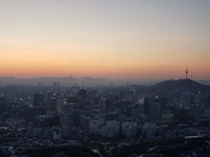 A winter sunrise in Seoul with a view of the city