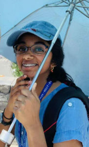Aparna holding her umbrella