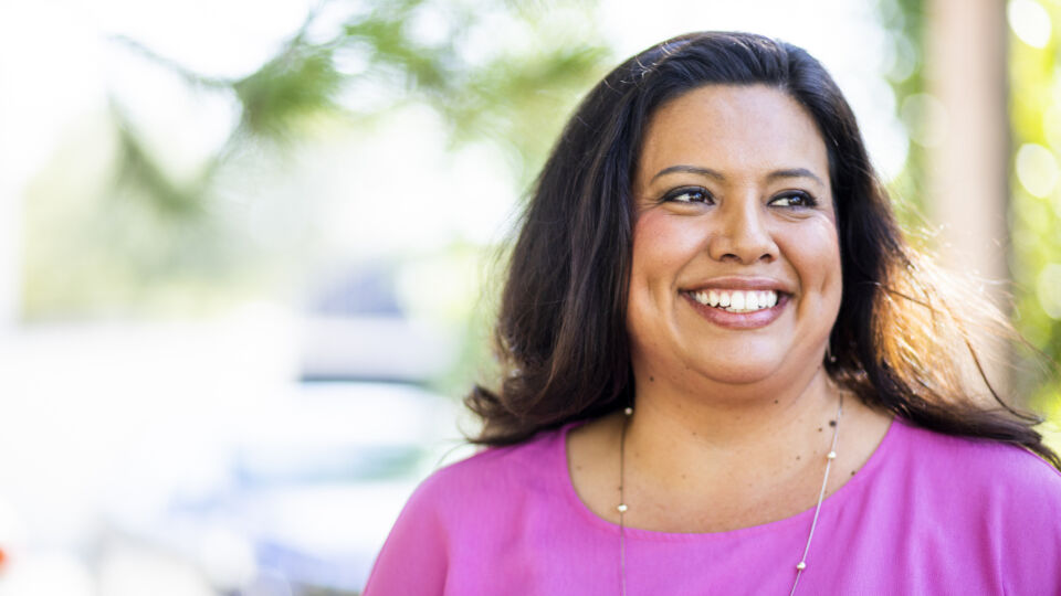 Woman smiling outside