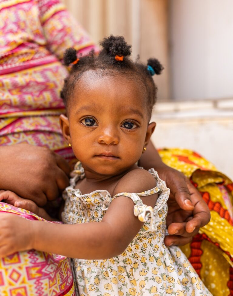 Christolyte with her mother, Ghana, 2025.