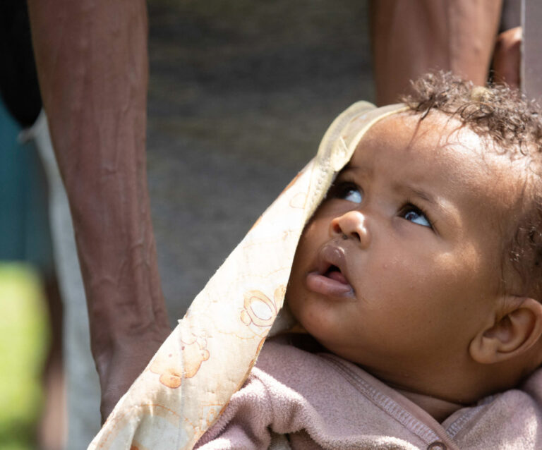 Ethiopia 2019 c Z Abubeker MDA distribution An infant is measured with a dose pole