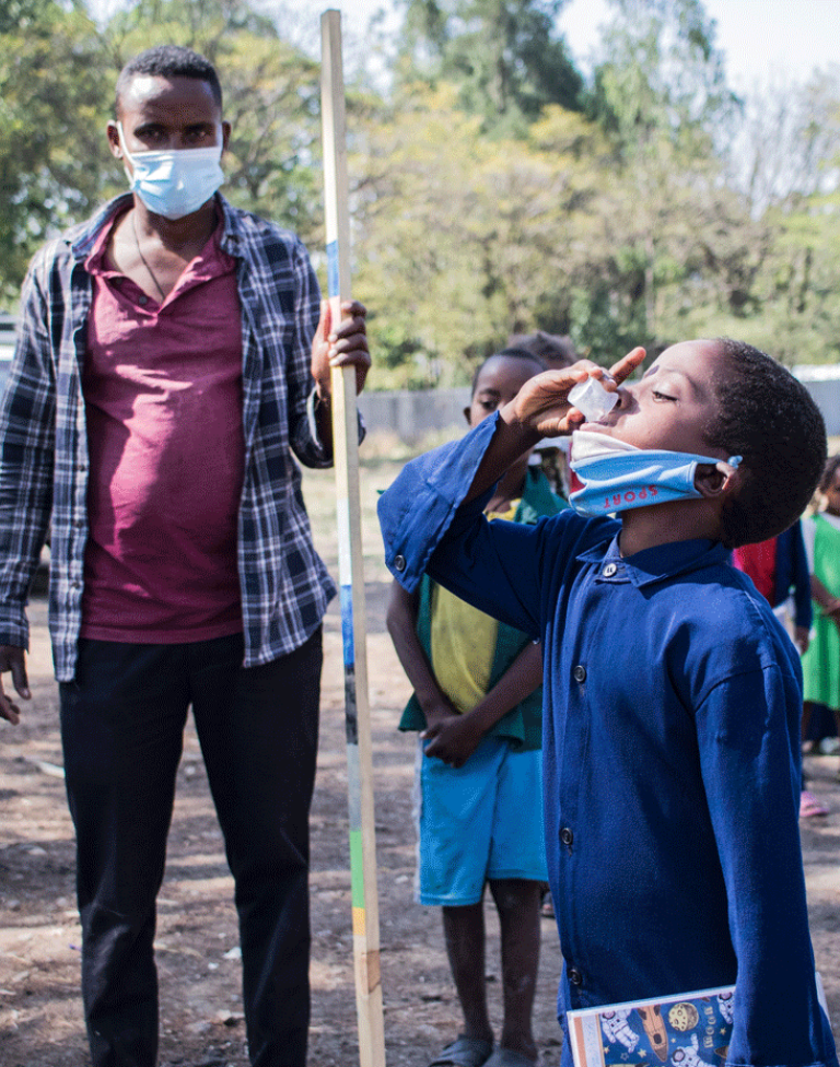 Ethiopia Trachoma Mda Boy Taking Meds