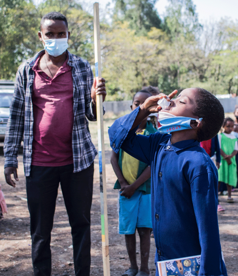 Ethiopia Trachoma Mda Boy Taking Meds