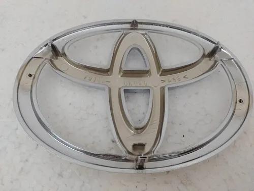 Emblema dianteiro - TOYOTA - 753110K040