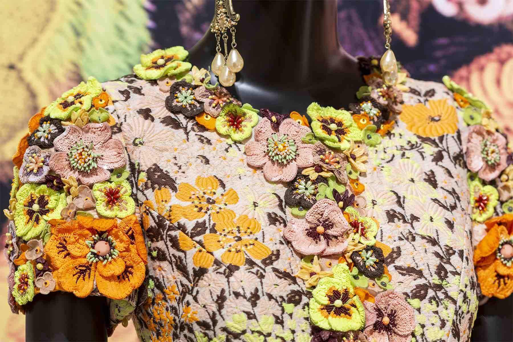 Detail of one of Andrew Gn’s designs in the gallery, featuring flower motifs.