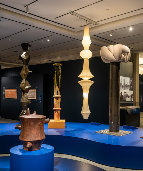 Hanging sculptural Akari lights with other Noguchi sculptures