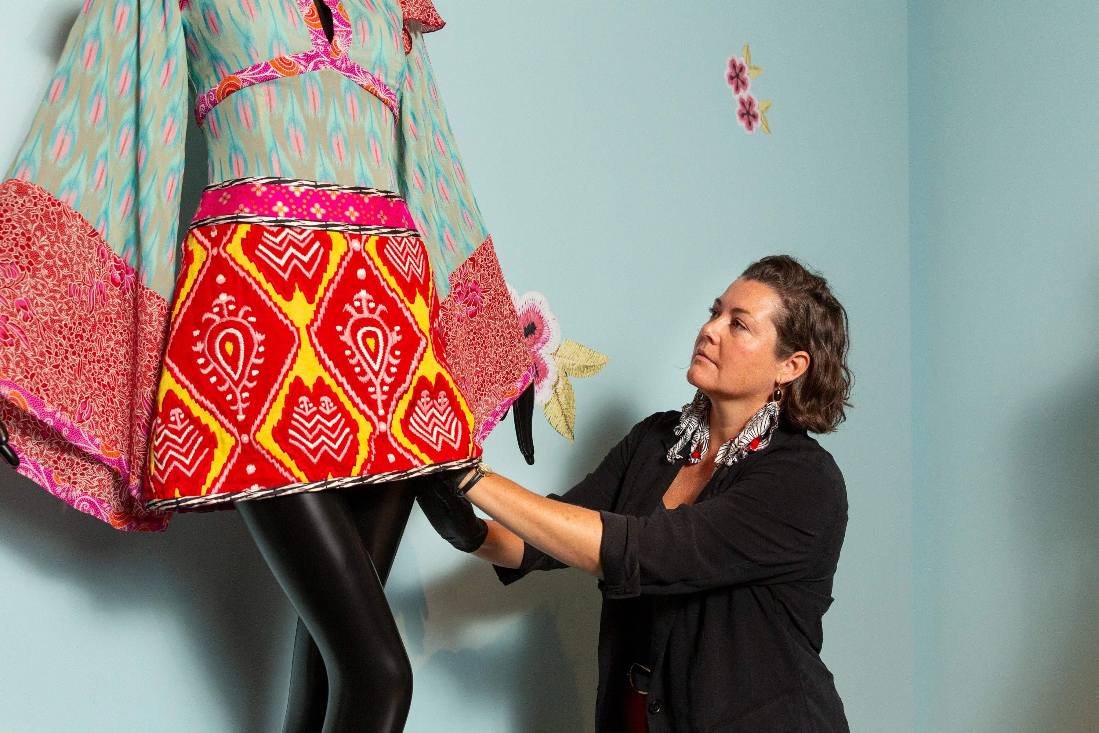 Petra Slinkard, PEM’s Nancy B. Putnam Curator of Fashion and Textiles, in the Andrew Gn exhibition